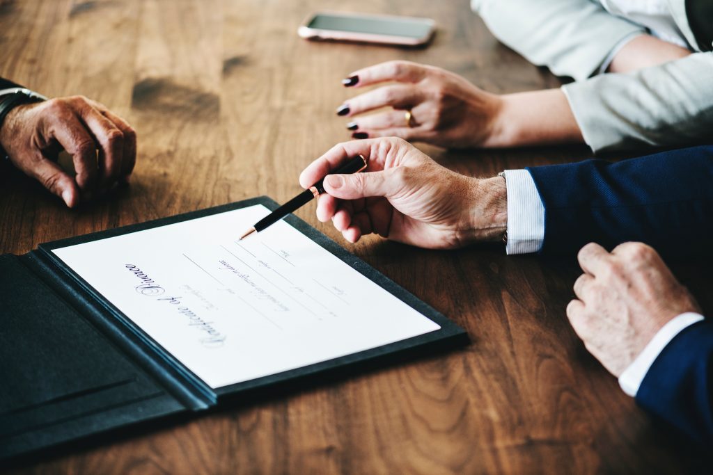 business people hands on wood table